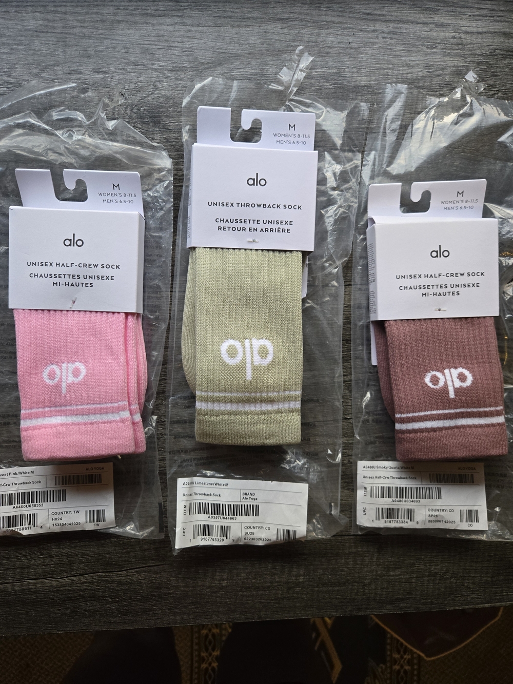 ALO Yoga Unisex Half-Crew Socks in Sweet Pink, Limestone, and Smokey Quartz